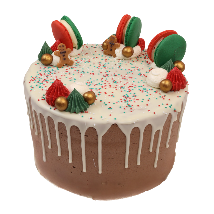 Layer cake Merry Christmas met macarons, gingerbread poppetjes, vanillecrème en witte chocoladedrip.